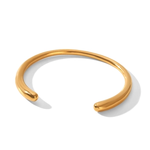 Brazalete minimalista de acero inoxidable chapado en oro de 18 quilates con gotas pulidas
