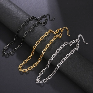 Detailed view of stainless steel chunky cross chains in gold, silver, and black finishes.