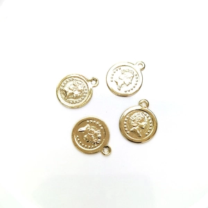 Set of four 14K gold plated round coin charms with queen embossed relief design