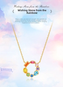 Macro shot of circular rainbow zircon pendant with colorful gemstones on a gold chain