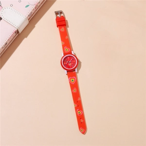 Detail of red silicone kids watch strap with colorful heart patterns and quartz dial