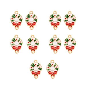 Macro view of 10 Christmas wreath alloy pendants with red bows and enamel detailing