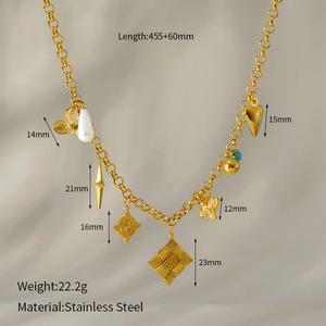 Detail of gold-plated stainless steel heart and butterfly charms on a layered necklace