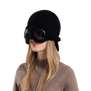 Women black winter knit hat with ear flaps and integrated protective goggles for windproofing