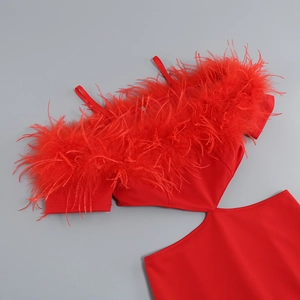 Detail of red off-shoulder dress featuring premium feather trim and hidden back zipper