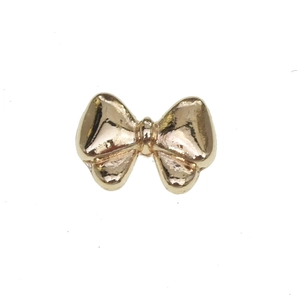 Golden bow-shaped alloy nail art accessory for DIY jewelry making on white background