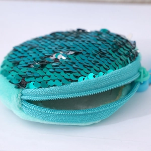 Sparkly teal sequin round coin purse with plush back and secure zipper closure