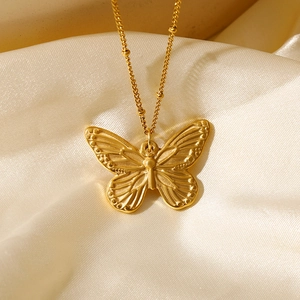 Vintage 18K gold plated stainless steel butterfly coin pendant necklace on silk