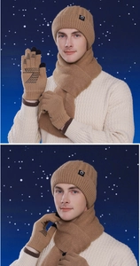 Detail of camel knit gloves with touchscreen fingertips and non-slip palm texture