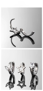 Détail de boucles d'oreilles en acier argenté avec motifs étoile et zircone