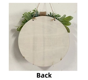 Detail view showing the natural wood grain back and hanging twine of the Christmas wreath