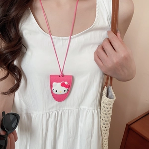 Pink faux leather card holder featuring a cute cartoon cat character on a long neck strap