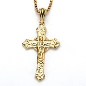 Close-up of gold stainless steel hip hop cross pendant with detailed portrait embossing