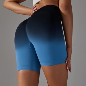 Macro detail of seamless gradient yoga shorts showing breathable fabric texture and high waist