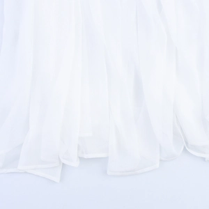 Elegant white floral maxi dress in sheer chiffon fabric with a delicate draped hemline