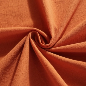 Orange pumpkin cotton ruffled tablecloth showing natural cotton linen fabric texture