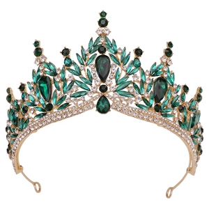 Exquisite gold bridal crown featuring emerald teardrop gems and sparkling rhinestones