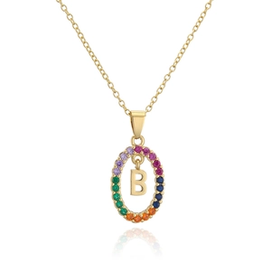 Detailed close-up of gold letter B pendant featuring a sparkling rainbow zircon halo design