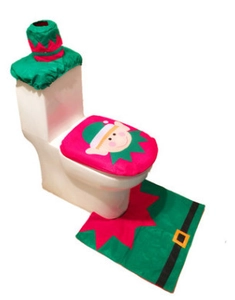 Detail of Christmas elf toilet seat cover set with mat and tank lid in red and green