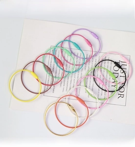 Macro detail of colorful stainless steel wire keychains with secure screw lock connectors