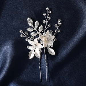 Handmade bridal hair pin with white flowers, silver leaves and crystal beads on blue satin