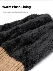 Close-up of thick black fleece lining and brown knit fabric of the winter thermal hat