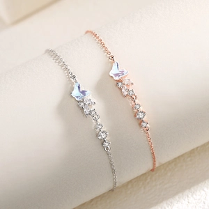Bracelet papillon élégant en argent sterling serti de zircons et d'ailes opales