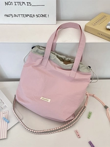 Tragetasche aus Segeltuch in Rosa und Grau mit Kordelzug und breitem gewebtem Schultergurt