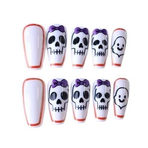 Halloween coffin fake nails set featuring purple bow skeletons and cute ghost patterns