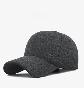 Close-up of thick grey wool blend baseball cap with Sport metal plaque detail