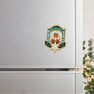 Detail of metal souvenir magnet featuring Saint Sophia Cathedral in Harbin with snowflakes
