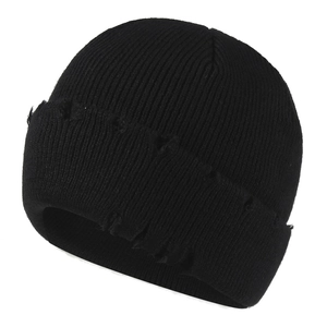 Black distressed knit beanie with ribbed texture and punk style ripped details