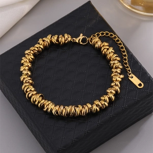 Polished gold-plated stainless steel rope chain bracelet with adjustable lobster clasp