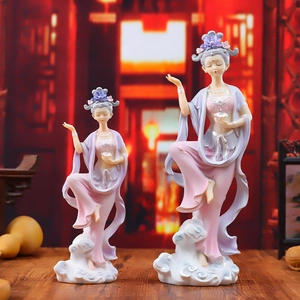 Ancient Chinese Dunhuang Flying Fairy resin statues in pink and purple on wooden base