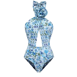 Detail view of light blue floral swimsuit with 3D rose and waist cut-out detail