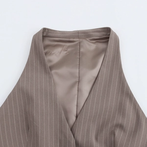 Detailed view of the halter vest neckline showing brown stripes and premium inner lining