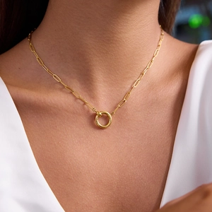 Close-up of 18K gold stainless steel long link chain necklace with a round pendant