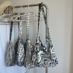 Bohemian large capacity cotton linen crossbody bags with diverse ethnic floral prints