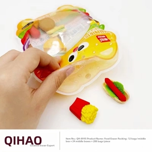 Detail of creative food-shaped erasers including fries and hot dogs in yellow cartoon pouch