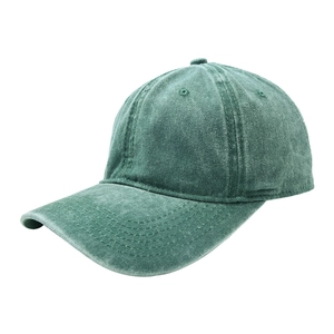 Close-up of vintage washed green cotton baseball cap showing stitching and fabric texture