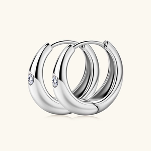 Elegant silver sterling hoops with sparkling moissanite stones and polished finish
