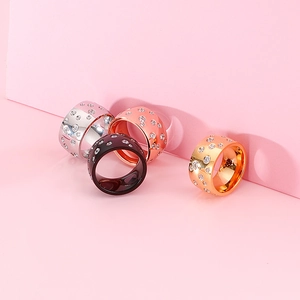 Polished stainless steel rings in gold, rose gold, silver and black with cubic zirconia stones