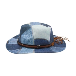 Patchwork denim cowboy hat with blue fabric tones and a studded leather hatband
