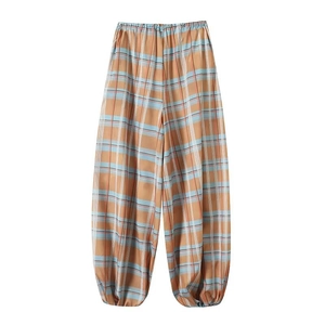 Women's orange and blue plaid lantern pants with elastic waist and cuffed hem