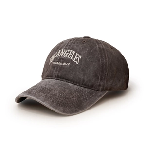 Detail view of charcoal grey vintage washed cotton baseball cap with white embroidery