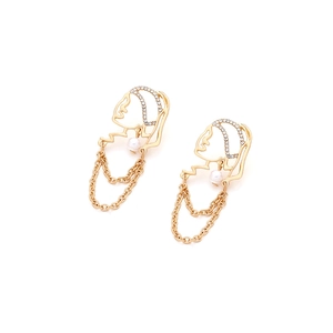 Vintage gold-tone face silhouette tassel earrings with sparkling rhinestones and white pearls