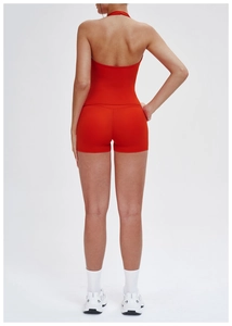 Detailed back view of red halter yoga top and high-stretch shorts set for fitness