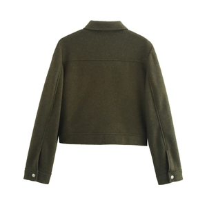 Vue arrière détaillée de la veste en tweed vert foncé montrant la texture du tissu