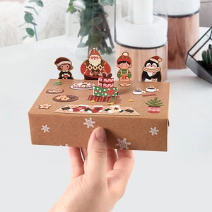 3D cartoon animal Christmas kraft paper gift box featuring Santa and penguin decorations