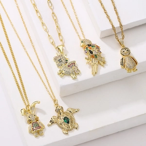 Collane placcate in oro con ciondoli animali in zircone tra cui unicorno e pappagallo